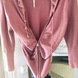 Pink and glittered form fitting hoody